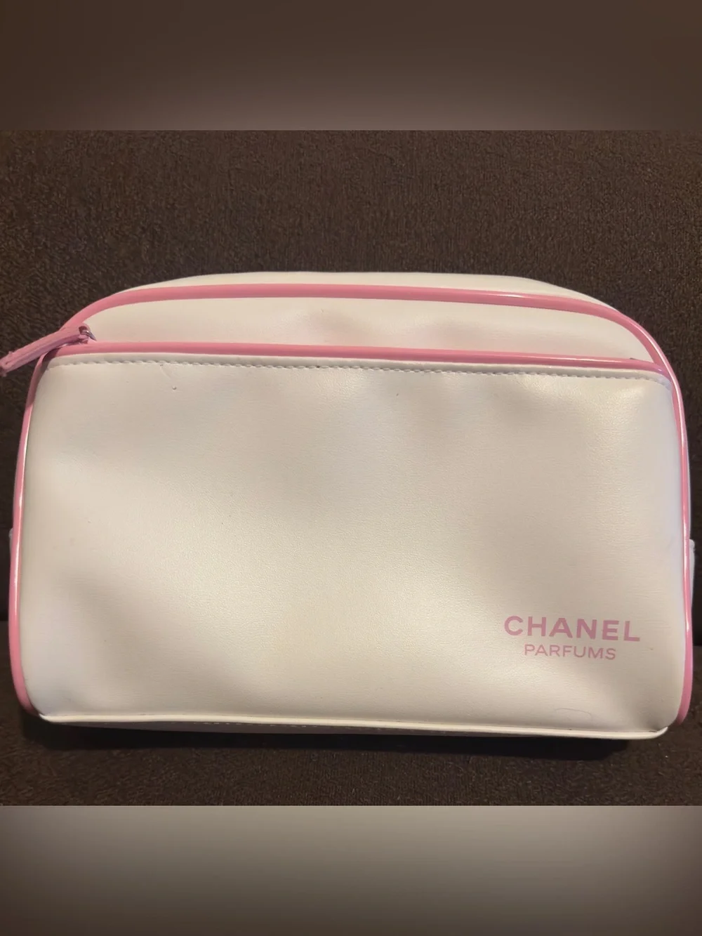 CHANEL White Cosmetic Pouch with Pink Trim. 9.25”W x 7”H.